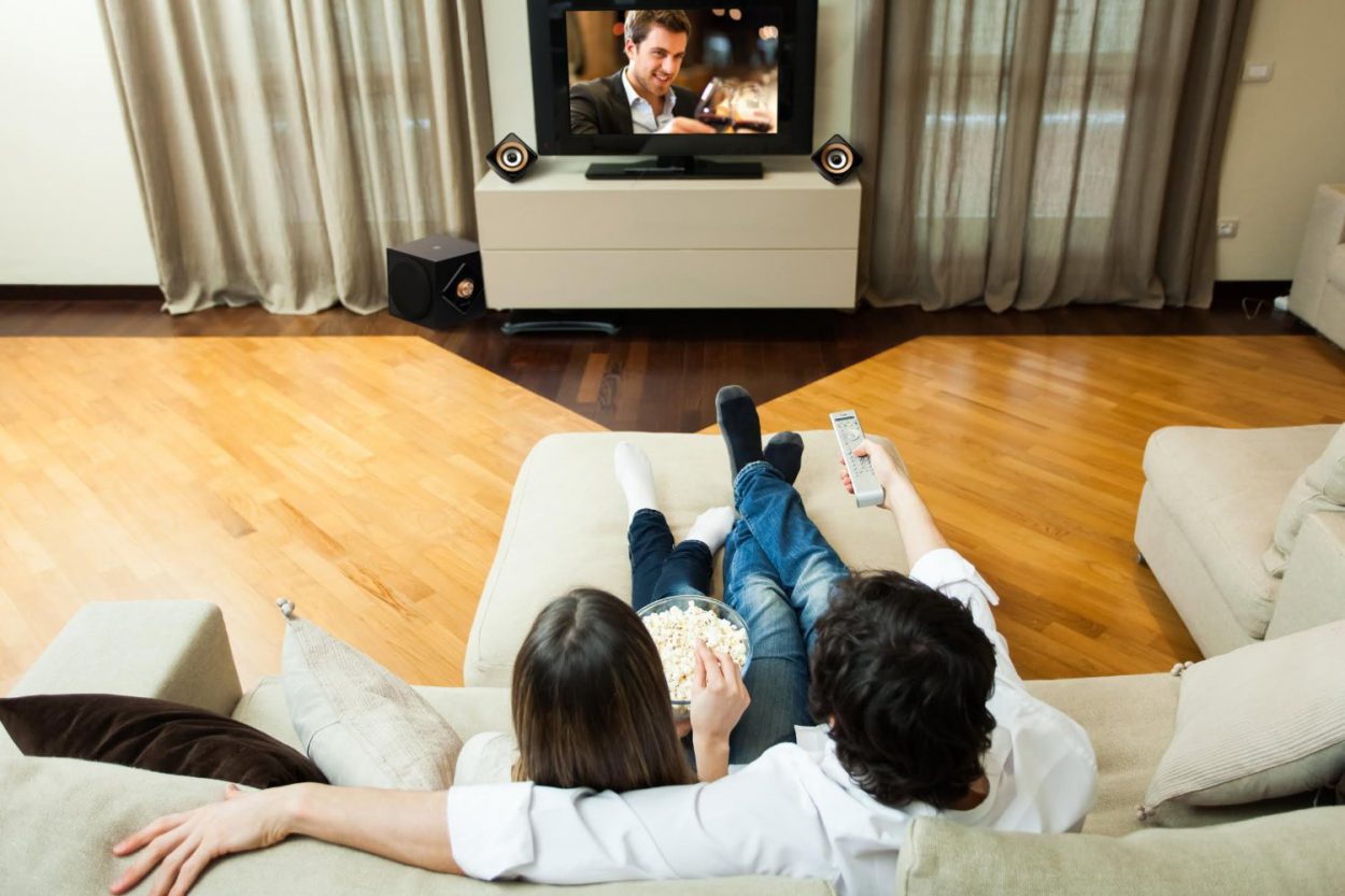 Couple on the couch watching TV