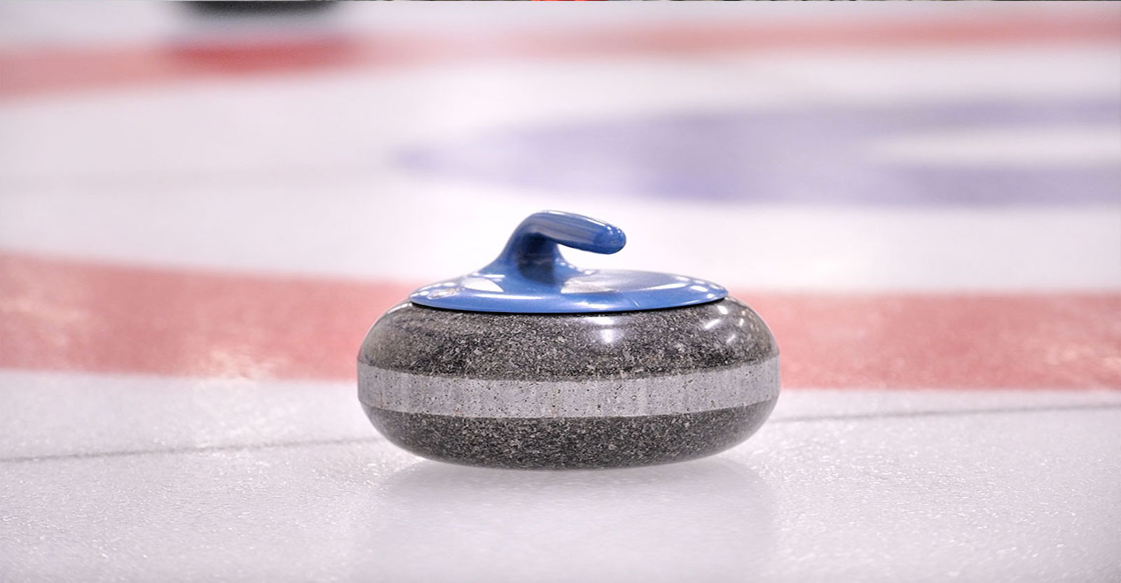 Curling rock on the ice